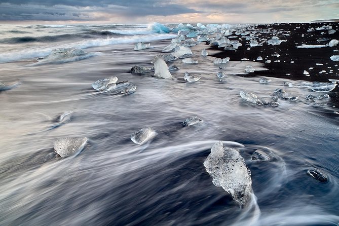 2-Day Ice Cave & South Coast: Glacier Hike and Glacier Lagoon - Fellsfjara: black sand with iceberg fragments
