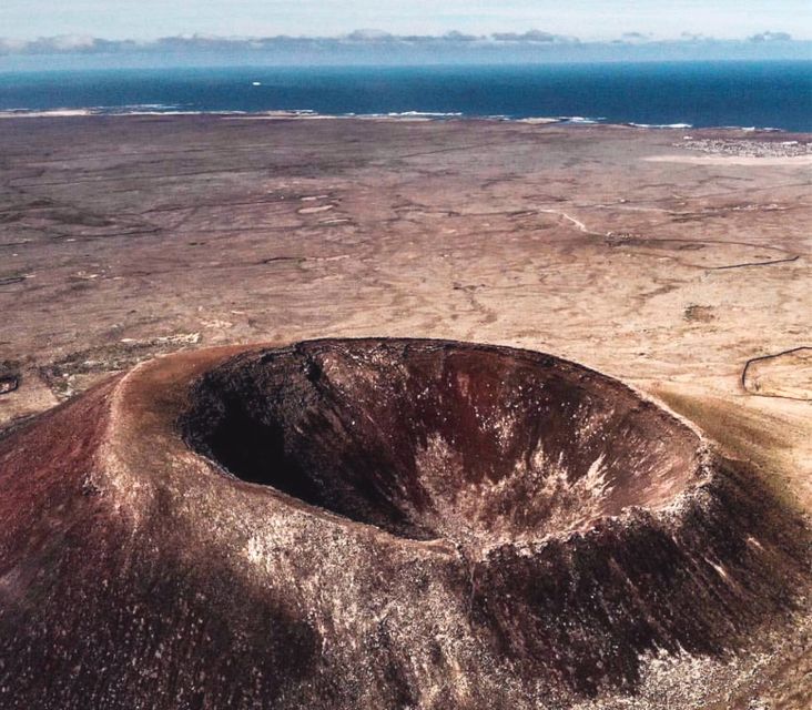 Caleta de Fuste/Corralejo: Guided E-Bike Tour & Crater Hike - Lajares and Cañada de Melián: pass-through stops with a reason