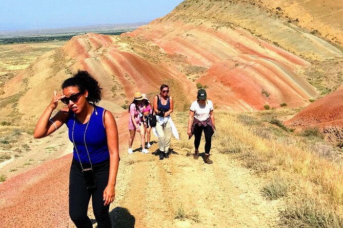 David Gareji and Real Rainbow Mountains Off-Road adventure + hike - Kapatadze Lake: salt, white patches, and desert sky photos