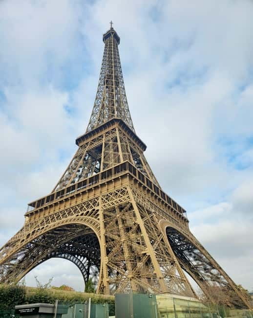 Eiffel Tower Entry: Summit or 2nd Floor with Audioguide - The Eiffel Tower ride up: second floor first, then choose your next move