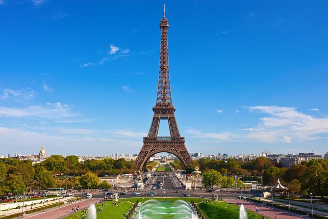 Eiffel Tower Summit Option with Seine River Cruise and City Tour - The city tour by coach: lots of sights, audio does the heavy lifting