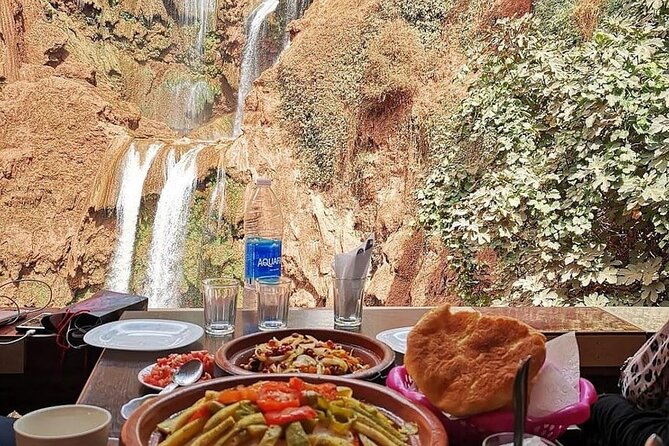 Explore Ouzoud waterfalls Marrakech Guided Hike & Boat Experience - Moroccan lunch after the walking: a calmer pace