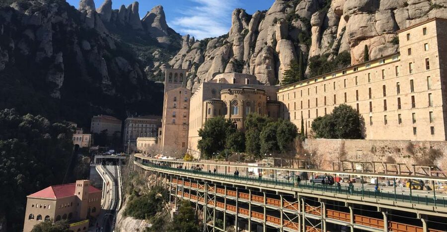 From Barcelona: Montserrat Monastery & Scenic Mountain Hike - The Benedictine Abbey: your first 11th-century stop