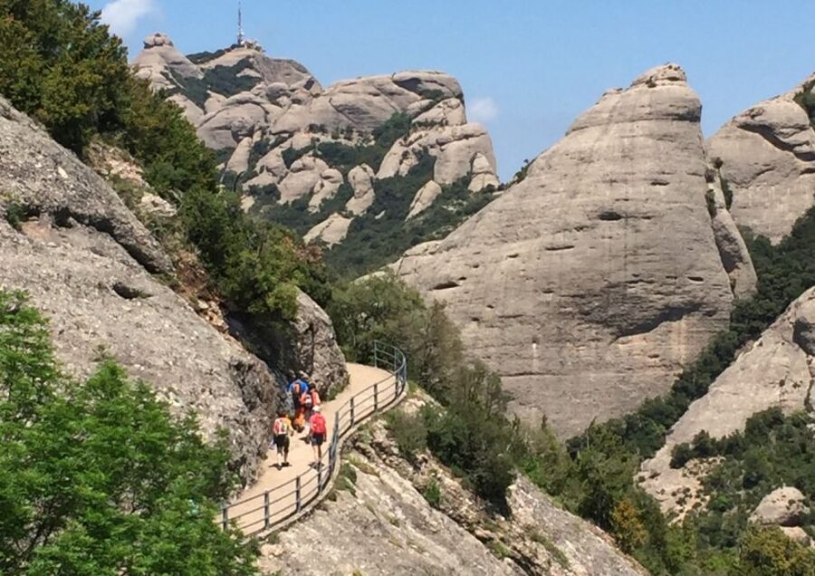 From Barcelona: Montserrat Monastery & Scenic Mountain Hike - Free time and local markets near the monastery
