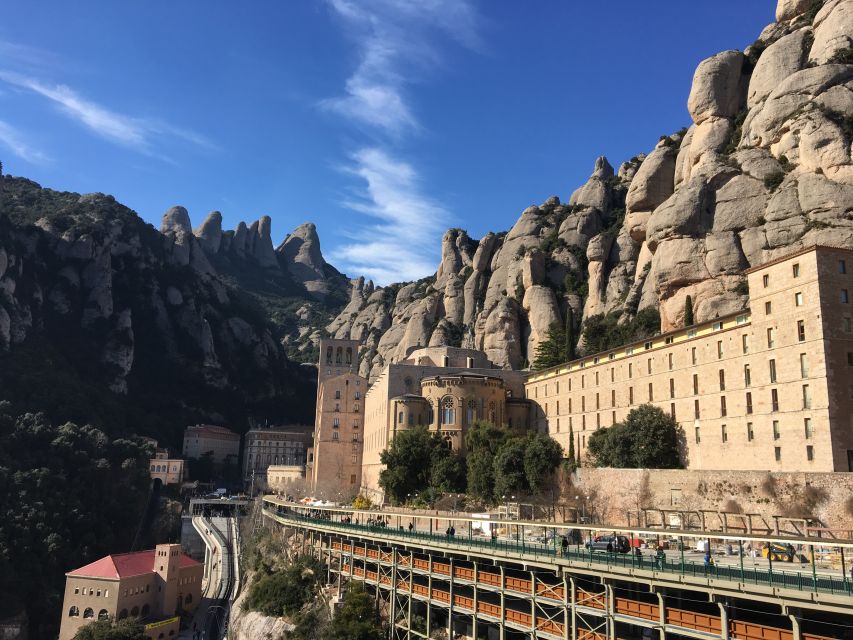From Barcelona: Montserrat Monastery & Scenic Mountain Hike - Meeting in Barcelona and the 55-minute transfer uphill