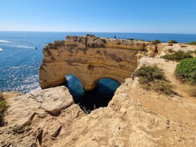 From Faro: Benagil Cliffs Hiking & 4 Treasures Experience - Praia da Marinha: Titanic, heart, and bridge cliff shapes