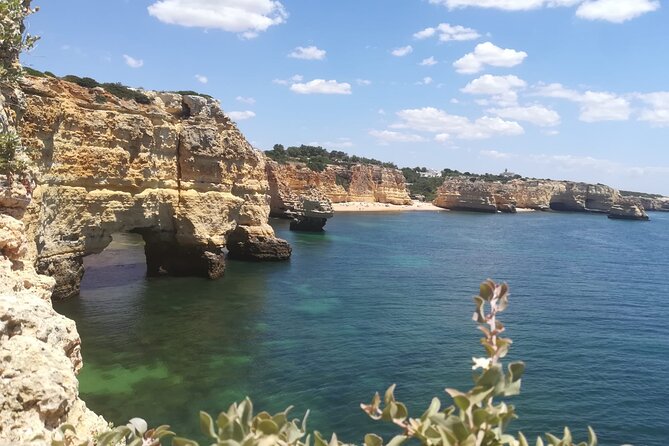 From Faro: Benagil Hiking Cliffs and the 4 Treasure Experience - Praia da Marinha: the cliff hike that leads to iconic rock shapes