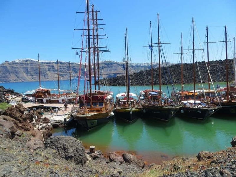 From Thera: Thirasia Cruise w/ Volcano Hike and Hot Springs - From Athinios Port to the Caldera: The Morning Setup