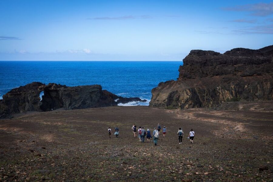 Fuerteventura: Wild Coast and Legends Hike - The rugged west coast: black beach, monolith, and rock arch vibes