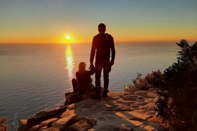 Hiking Lion's Head for Sunrise or Sunset - Summit moment: 360° Cape Town views with Table Mountain behind you