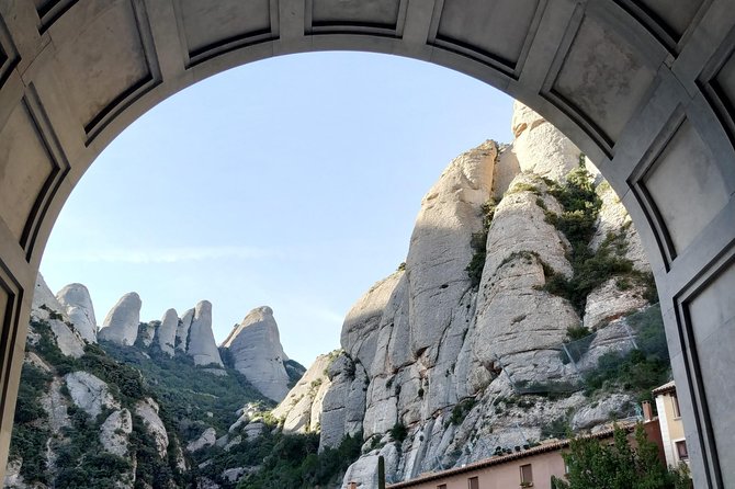 Montserrat Hiking Experience & Monastery Premium Small Group Tour - The Montserrat monastery visit: basilica, cloister, and real context