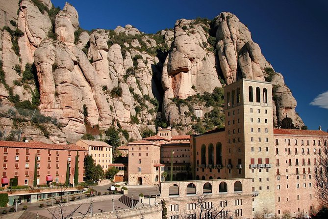 Montserrat Monastery with Easy Hike & Sitges Tour from Barcelona - Guided Sitges old town stops: Passeig Marítim to Raco de la Calma