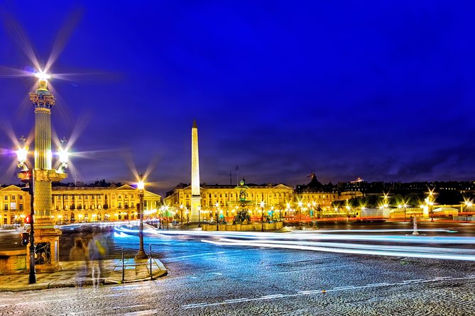 Paris Lights Evening Bus Tour with Eiffel Tower Summit Option - Champs-Élysées, Arc de Triomphe, and the big boulevards at night