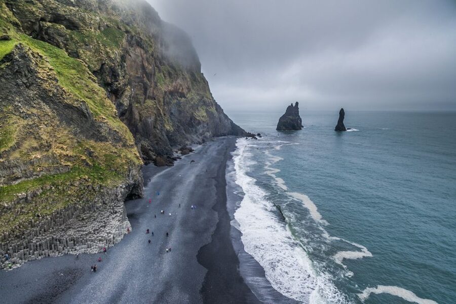 Reykjavik: Glacier Hike & South Coast Day Tour - Reynisfjara black sand beach: basalt columns and serious surf
