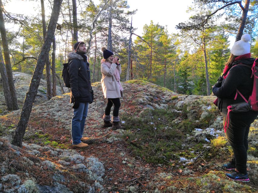 Stockholm: Nature Hike with Campfire Lunch - The darker stretch: torches, winter light, and keeping your balance