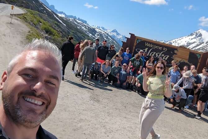 Summer Sled Dog Remote Yukon Camp & Summit Tour - White Pass summit and the Welcome to Alaska sign photo stop