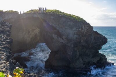 Taino Indian Cave, Arecibo Hike and Beach Tour from San Juan - Cuerva del Indio Cave Hike: Petroglyphs, Tight Passages, and Getting Coach-Help